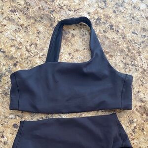 Left on Friday one shoulder, black top size small